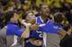 Kentucky's Aaron Harrison celebrates with his teammates after an NCAA Midwest Regional final college basketball tournament game against Michigan Sunday, March 30, 2014, in Indianapolis. Kentucky won 75-72 to advance to the Final Four. (AP Photo/David J. Phillip)