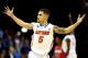 MEMPHIS, TN - MARCH 29: Scottie Wilbekin #5 of the Florida Gators celebrates after hitting a three pointer to end the first half against the Dayton Flyers during the south regional final of the 2014 NCAA Men's Basketball Tournament at the FedExForum on March 29, 2014 in Memphis, Tennessee. (Photo by Streeter Lecka/Getty Images)