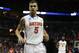 Florida guard Scottie Wilbekin (5) runs off the court against Dayton during the first half in a regional final game at the NCAA college basketball tournament, Saturday, March 29, 2014, in Memphis, Tenn. (AP Photo/John Bazemore)