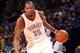 OKLAHOMA CITY, OK - MARCH 30: Kevin Durant #35 of the Oklahoma City Thunder handles the ball against the Utah Jazz on March 30, 2014 at the Chesapeake Energy Arena in Oklahoma City, Oklahoma. NOTE TO USER: User expressly acknowledges and agrees that, by downloading and or using this Photograph, user is consenting to the terms and conditions of the Getty Images License Agreement. Mandatory Copyright Notice: Copyright 2014 NBAE (Photo by Layne Murdoch/NBAE via Getty Images)