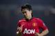 Manchester United's Shinji Kagawa winces as his team lose 3-0 to Manchester City during their English Premier League soccer match at Old Trafford Stadium, Manchester, England, Tuesday, March 25, 2014. (AP Photo/Jon Super)