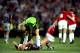 26 May 1999: Peter Schmeichel of Manchester United consoles Carsten Jancker of Bayern Munich after United beat Bayern in the European Champions League Final in the Nou Camp Stadium, Barcelona, Spain. Manchester United won 2 - 1 with both United goals scored during injury time, to secure the treble of League, FA Cup and European Cup. \ Mandatory Credit: Shaun Botterill /Allsport