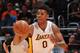 LOS ANGELES, CA - MARCH 30: Nick Young #0 of the Los Angeles Lakers drives against the Phoenix Suns at STAPLES Center on March 30, 2014 in Los Angeles, California. NOTE TO USER: User expressly acknowledges and agrees that, by downloading and/or using this Photograph, user is consenting to the terms and conditions of the Getty Images License Agreement. Mandatory Copyright Notice: Copyright 2014 NBAE (Photo by Andrew D. Bernstein/NBAE via Getty Images)