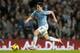 Manchester City's Samir Nasri takes the ball down field during his team's 3-0 win over Swansea City in their English Premier League soccer match at the Etihad Stadium, Manchester, England, Sunday, Dec. 1, 2013. (AP Photo/Jon Super)