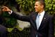WASHINGTON - MAY 11: U.S. President Barack Obama waves goodbye to guests after welcoming members of the University of North Carolina men's basketball team to the White House May 11, 2009 in Washington, DC. The North Carolina Tar Heels are the 2009 National Collegiate Athletic Association (NCAA) Division I national champions. A basketball fan, Obama picked the Tar Heels to win in his March Madness bracket. (Photo by Chip Somodevilla/Getty Images)