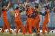 Netherlands's Timm van der Gugten, third right, celebrates with his teammates the wicket of England's Eoin Morgan during their ICC Twenty20 Cricket World Cup match in Chittagong, Bangladesh, Monday, March 31, 2014. (AP Photo/A.M. Ahad)