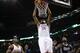 Oklahoma City Thunder forward Kevin Durant (35) dunks in front of teammate Serge Ibaka (9) and Sacramento Kings center DeMarcus Cousins (15) in the third quarter of an NBA basketball game in Oklahoma City, Friday, March 28, 2014. Oklahoma City won 94-81. (AP Photo/Sue Ogrocki)