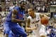 Dec 2, 2013; Storrs, CT, USA; Connecticut Huskies guard Shabazz Napier (13) drives the ball against Florida Gators center Patric Young (4) in the first half at Harry A. Gampel Pavilion. Mandatory Credit: David Butler II-USA TODAY Sports