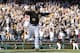 PITTSBURGH, PA - MARCH 31: Neil Walker #18 of the Pittsburgh Pirates celebrates after hitting a walk off solo home run in the tenth inning against the Chicago Cubs during Opening Day at PNC Park March 31, 2014 in Pittsburgh, Pennsylvania. (Photo by Justin K. Aller/Getty Images)