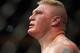 Brock Lesnar reacts to his first round TKO loss by Alistair Overeem of the Netherlands right after their UFC heavyweight mixed martial arts match Friday, Dec. 30, 2011 at The MGM Grand Garden Arena in Las Vegas. (AP Photo/Eric Jamison)