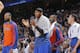 OAKLAND, CA - MARCH 30: Carmelo Anthony #7 of the New York Knicks cheers from the sideline in a game against the Golden State Warriors on March 30, 2014 at Oracle Arena in Oakland, California. NOTE TO USER: User expressly acknowledges and agrees that, by downloading and or using this photograph, user is consenting to the terms and conditions of Getty Images License Agreement. Mandatory Copyright Notice: Copyright 2014 NBAE (Photo by Rocky Widner/NBAE via Getty Images)