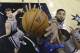 Dallas Mavericks' Monta Ellis, front, is fouled by San Antonio Spurs' Tim Duncan (21) as he tries to score during the first half of an NBA basketball game, Sunday, March 2, 2014, in San Antonio. San Antonio won 112-106. (AP Photo/Eric Gay)