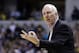 San Antonio Spurs head coach Gregg Popovich looks for a three second call in the first half of an NBA basketball game against the Indiana Pacers in Indianapolis, Monday, March 31, 2014. (AP Photo/Michael Conroy)