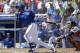 Toronto Blue Jays' Jose Reyes hits a first-inning double off Detroit Tigers starting pitcher Kyle Lobstein in a spring training baseball game against the Detroit Tigers in Dunedin, Fla., Saturday, March 22, 2014. The Jays defeated the Tigers 9-4. (AP Photo/Kathy Willens)