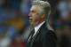 Real's coach Carlo Ancelotti gestures during a Champions League round of 16 second leg soccer match between Real Madrid and FC Schalke 04 at the Santiago Bernabeu stadium in Madrid, Tuesday, March 18, 2014. (AP Photo/Andres Kudacki)
