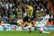 MADRID, SPAIN - APRIL 30: Robert Lewandowski of Borussia Dortmund shoots past Raphael Varane of Real Madrid during the UEFA Champions League Semi Final Second Leg match between Real Madrid and Borussia Dortmund at Estadio Santiago Bernabeu on April 30, 2013 in Madrid, Spain. (Photo by Gonzalo Arroyo Moreno/Getty Images)