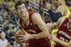 Wisconsin forward Frank Kaminsky (44) pulls down a rebound next to teammate guard Josh Gasser (21) during the first half of an NCAA college basketball game against Michigan in Ann Arbor, Mich., Sunday, Feb. 16, 2014. Kaminsky finished with 25 points in the Badgers 75-62 win. (AP Photo/Carlos Osorio)