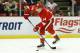 Detroit Red Wings center Gustav Nyquist (14), of Sweden, shoots against the Toronto Maple Leafs in the second period of an NHL hockey game in Detroit, Tuesday, March 18, 2014. (AP Photo/Paul Sancya)