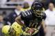 U.S. Army All-American East's Jacob Park (10) is sacked by U.S. Army All-American West's Sione Teuhema (19) during the U.S. Army All-American Bowl football game, Saturday, Jan. 4, 2014, in San Antonio. (AP Photo/Eric Gay)