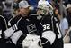 Los Angeles Kings goalie Jonathan Quick (32) celebrates with Los Angeles Kings back up goalie Martin Jones (31) after defeating the Winnipeg jets, 4-2, after thier NHL hockey game at the Staples Center Saturday, March 29, 2014, in Los Angeles. (AP Photo/Kevork Djansezian)