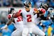 CHARLOTTE, NC - NOVEMBER 03: Matt Ryan #2 of the Atlanta Falcons drops back to pass against the Carolina Panthers during play at Bank of America Stadium on November 3, 2013 in Charlotte, North Carolina. The Panthers won 34-10. (Photo by Grant Halverson/Getty Images)