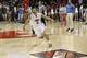 SMU guard Nic Moore (11) celebrates as time expires in an NCAA college basketball game against California in the quarterfinals of the NIT, Wednesday, March 26, 2014, in Dallas. SMU won 67-65 and Moorw hit the game-winning basket. (AP Photo/Sharon Ellman)