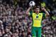 NORWICH, ENGLAND - MARCH 22: Russell Martin of Norwich City takes a throw during the Barclays Premier League match between Norwich City and Sunderland at Carrow Road on March 22, 2014 in Norwich, England. (Photo by Alex Broadway/Getty Images)