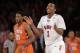 SMU's Sterling Brown (3) and Clemson's Damarcus Harrison (21)react during the second half of an NCAA college basketball game in the semifinals of the NIT Tuesday, April 1, 2014, in New York. SMU won the game 65-59. (AP Photo/Frank Franklin II)