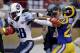 Tennessee Titans running back Chris Johnson (28) scores on a 19-yard run past St. Louis Rams safety Rodney McLeod (23) during the fourth quarter of an NFL football game Sunday, Nov. 3, 2013, in St. Louis. (AP Photo/Jeff Roberson)