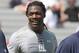 South Carolina defensive end Jadeveon Clowney, center, talks during South Carolina's pro day in Columbia, S.C., Wednesday, April 2, 2014. (AP Photo/Mary Ann Chastain)