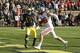 Ohio State tight end Jeff Heuerman (86), defended by Michigan safety Josh Furman (14), scores during the second half of an NCAA college football game in Ann Arbor, Mich., Saturday, Nov. 30, 2013. (AP Photo/Carlos Osorio)