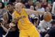 Utah Jazz's Derrick Favors, left, guards Los Angeles Lakers' Chris Kaman (9) during the second half of an NBA basketball game Friday, Dec. 27, 2013, in Salt Lake City. The Jazz won 105-103. (AP Photo/Gene Sweeney Jr.)