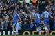 Chelsea's Oscar celebrates after scoring his side's 5th goal during their English Premier League soccer match between Chelsea and Arsenal at Stamford Bridge stadium in London, Saturday, March, 22, 2014. (AP Photo/Alastair Grant)