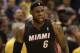 Miami Heat forward LeBron James (6) in action as the Indiana Pacers played the Miami Heat in an NBA basketball game in Indianapolis, Wednesday, March 26, 2014. The Pacers won 84-83. (AP Photo/AJ Mast)