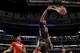 McDonald's West All-American Jahlil Okafor dunks the ball past McDonald's East All-American Karl-Anthony Towns, left, during the second half of the McDonald's All-American boy's basketball game Wednesday, April 2, 2014, in Chicago. The West won 105-102. (AP Photo/Charles Rex Arbogast)