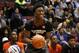 McDonald's West All-American Stanley Johnson, of Fullerton, Calif., competes in the three-point shootout during the McDonald's All-American Jam Fest at the University of Chicago in Chicago, on Monday, March 31, 2014. (AP Photo/Andrew A. Nelles)