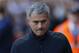 Chelsea's manager Jose Mourinho arrives at the dugout before the start of their English Premier League soccer match against Crystal Palace at Selhurst Park, London, Saturday, March 29, 2014. (AP Photo/Sang Tan)
