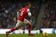 MANCHESTER, ENGLAND - DECEMBER 14: Aaron Ramsey of Arsenal in action during the Barclays Premier League match between Manchester City and Arsenal at Etihad Stadium on December 14, 2013 in Manchester, England. (Photo by Clive Brunskill/Getty Images)