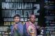 Boxer Manny Pacquiao, of the Phillipines, left, poses for a photo with Timothy Bradley of Indio, Ca., the current WBO World Welterweight champion, during a press conference,Thursday, Feb. 6, 2014, in New York. The pair will face off in a rematch April 12, 2014, in Las Vegas. Bradley won their first encounter. (AP Photo/Kathy Willens)