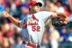 St. Louis Cardinals starting pitcher Michael Wacha throws against the Cincinnati Reds in the fourth inning of a baseball game, Wednesday, April 2, 2014, in Cincinnati. (AP Photo/Al Behrman)