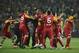 Galatasaray players celebrate after their soccer derby match against Fenerbahce in Istanbul, Turkey, Saturday, May 12, 2012. One fan was reportedly stabbed after Galatasaray's Turkish league championship triggered violence at the goalless derby match with Fenerbahce and across the country on Saturday. (AP Photo)