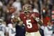 Florida State quarterback Jameis Winston (5) throws a pass against Auburn University in the 2014 BCS Championship NCAA College Football game on Monday, Jan. 6, 2014 in Pasadena, Calif. (AP Photo/Doug Benc)