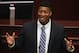 Florida State quarterback and 2013 Heisman Trophy winner Jameis Winston speaks Tuesday April 1, 2014 on the floor of the House of Representatives in Tallahassee, Fla. The Florida legislature honored the football team during Florida State Day at the Capitol for winning the BCS National Championship last January. (AP Photo/Phil Sears)