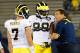 EAST HARTFORD, CT - SEPTEMBER 21: Brady Hoke, coach of the Michigan Wolverines, talks with Devin Gardner #98 and Shane Morris #7 before a game with the Connecticut Huskies at Rentschler Field on September 21, 2013 in East Hartford, Connecticut. (Photo by Jim Rogash/Getty Images)