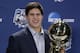 Creighton's Doug McDermott holds up his AP College Basketball Player of the Year trophy at a news conference Thursday, April 3, 2014, in Dallas. (AP Photo/David J. Phillip)