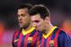 Barcelona's Lionel Messi, right leaves the field with Dani Alves at the end of a first leg quarterfinal Champions League soccer match between Barcelona and Atletico Madrid at the Camp Nou stadium in Barcelona, Spain, Tuesday April 1, 2014. (AP Photo/Manu Fernandez)