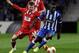 Sevilla's Alberto Moreno, left, challenges FC Porto's Silvestre Varela during their Europa League Quarter-final, first leg soccer match at the Dragao stadium, in Porto, Portugal, Thursday April 3, 2014. (AP Photo/Paulo Duarte)