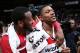 WASHINGTON, DC - APRIL 2: John Wall #2 and Bradley Beal #3 of the Washington Wizards celebrate clinching a playoff berth after the game against the Boston Celtics at the Verizon Center on April 2, 2014 in Washington, DC. NOTE TO USER: User expressly acknowledges and agrees that, by downloading and or using this photograph, User is consenting to the terms and conditions of the Getty Images License Agreement. Mandatory Copyright Notice: Copyright 2014 NBAE (Photo by Ned Dishman/NBAE via Getty Images)
