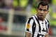 Juventus' Carlos Tevez walks on the pitch during an Europa League, round of 16, return-leg soccer match between Fiorentina and Juventus at the Artemio Franchi stadium in Florence, Italy, Thursday, March 20, 2014. (AP Photo/Fabrizio Giovannozzi)