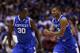 INDIANAPOLIS, IN - MARCH 30: Aaron Harrison #2 of the Kentucky Wildcats celebrates with teammate Julius Randle #30 after defeating the Michigan Wolverines 75 to 72 in the midwest regional final of the 2014 NCAA Men's Basketball Tournament at Lucas Oil Stadium on March 30, 2014 in Indianapolis, Indiana. (Photo by Jonathan Daniel/Getty Images)